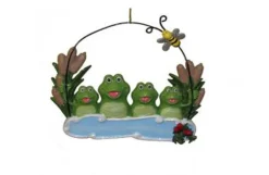 Family Of 4 Frogs In Pond